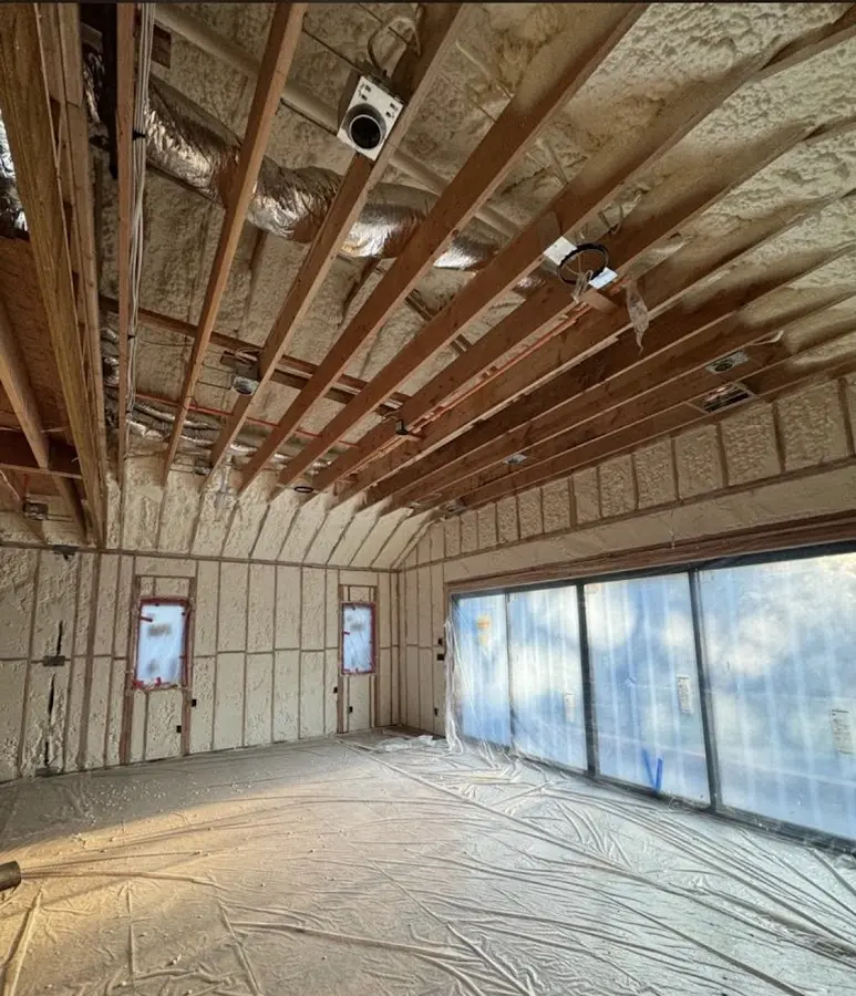 Interior walls and ceiling insulated with spray foam during new construction in Beaumont